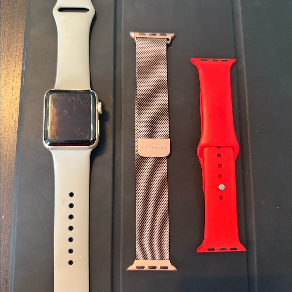 Apple Watch (series 2) with additional watch straps.